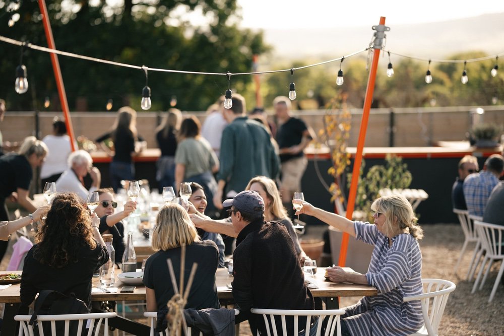 People enjoying wine on the terrace